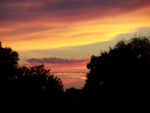 Sundown - Taken in Orlando FLorida at 7:30 p.m. It is sundown over us and a beautiful sky with great colors.