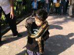 Is that a necklace? - NO it's a snake!  At Tanah Lot in Bali, they have 2 pythons. The one on Qiffy is the smaller snake.  This 3 year old of mine sure has the guts!!  Would you like to have this snake on you?