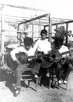 Playing guitar - Boys playing guitar, courtesy of Estela dalton. Check out the picture.