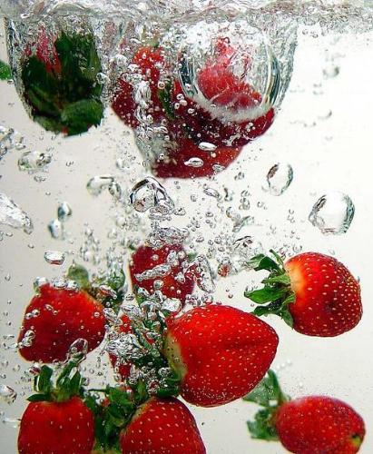 Strawberry Splash - Strawberries dropping in the water