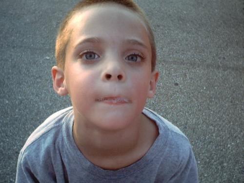 Gus sharing his spit - Gus at his first soccer practice