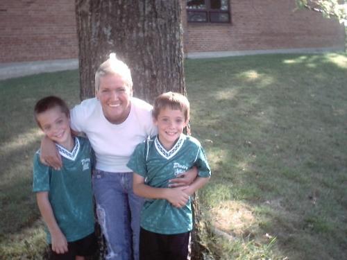 With mom at their first soccer game - First soccer game! They tied!