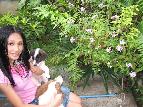 Me with our pets - I love dogs as well our whole family. Am just simple and moody..homebody but loves to travel..weird!!!
