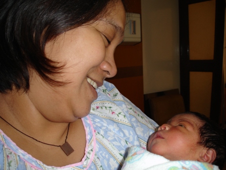 Joys of Motherhood - This was taken in the hospital a few days after I gave birth to my daughter.  Even if this is my second child already, the magic and wonder of pregnancy and childbirth is still as fresh and as mysterious as ever.