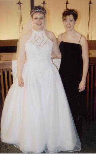Maid of Honor and me - My sister was my maid of honor. This will make you sick, she was pregnant at the time!!!