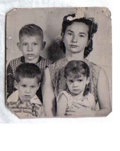 My mom , me and my two brothers - This is a family picture