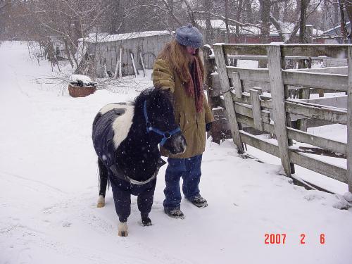 Chester in my coat - Another shot of Chester wearing one of my old coats to keep warm.