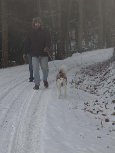 Coming Down the Mountain - This is my husband and daughter coming down the mountain with our two year old Husky, Loki