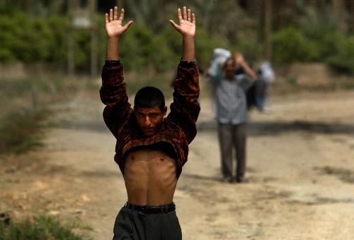 iraqi civilian - iraqi civilian with arms on air