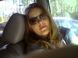 A photo of myself - Waiting in the car for my daughter as she gets her driver's license.