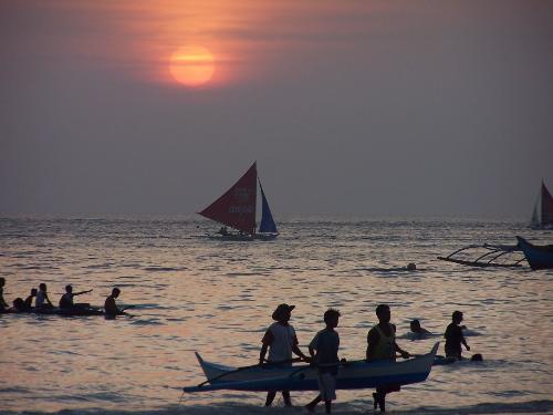 boracay summer sunset 3 - the bangkeros in a boracay sunset scene