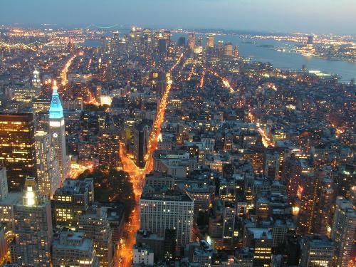 new york - New York City is the most populous city in the United States and one of the major global cities of the world. The city's business, financial and trading organizations play a significant role in the economy of the nation and of the world and contribute to the largest regional economy in the country.[1] The city is also one of the world's most important cultural centers and is the home of the United Nations. New York is sometimes referred to as the world's greatest city.  New York City has a population of 8.2 million within a land area of 321 square miles (830 km²),[2] making it the most densely populated city in North America. With a population of 18.7 million, the New York metropolitan area is one of the largest urban areas in the world.[3] The southwestern fringe of New York City is only 46 miles from the northeastern boundary of Philadelphia (and the downtowns of each are approximately 80 miles apart), creating an expansive metropolitan area with two of the five most populous cities in the United States in such close proximity.  New York City has been a center of the world's financial system since World War II and home to many of the world's most influential stock markets and financial institutions. In addition, it is the birthplace of many American cultural movements, including the Harlem Renaissance in literature, abstract expressionism in visual art, and hip hop in music. The city's cultural vitality has been fueled by immigration since its founding by Dutch settlers in 1623. In 2005, 36.6% of the city's population was foreign born.[4] New York City is also notable for having the lowest crime rate among the ten largest American cities.[5]
