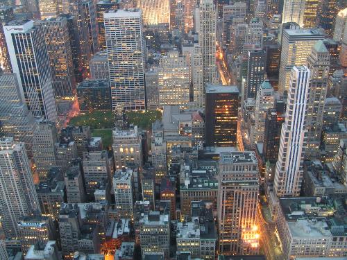 new york - New York City is the most populous city in the United States and one of the major global cities of the world. The city's business, financial and trading organizations play a significant role in the economy of the nation and of the world and contribute to the largest regional economy in the country.[1] The city is also one of the world's most important cultural centers and is the home of the United Nations. New York is sometimes referred to as the world's greatest city.  New York City has a population of 8.2 million within a land area of 321 square miles (830 km²),[2] making it the most densely populated city in North America. With a population of 18.7 million, the New York metropolitan area is one of the largest urban areas in the world.[3] The southwestern fringe of New York City is only 46 miles from the northeastern boundary of Philadelphia (and the downtowns of each are approximately 80 miles apart), creating an expansive metropolitan area with two of the five most populous cities in the United States in such close proximity.  New York City has been a center of the world's financial system since World War II and home to many of the world's most influential stock markets and financial institutions. In addition, it is the birthplace of many American cultural movements, including the Harlem Renaissance in literature, abstract expressionism in visual art, and hip hop in music. The city's cultural vitality has been fueled by immigration since its founding by Dutch settlers in 1623. In 2005, 36.6% of the city's population was foreign born.[4] New York City is also notable for having the lowest crime rate among the ten largest American cities.[5]