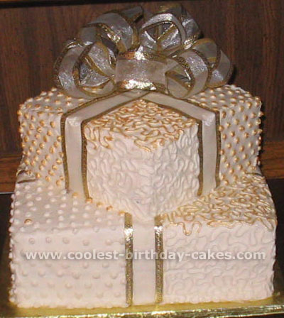 wedding cake - A really cool wedding cake decorated like a gift, complete with a big bow on top.