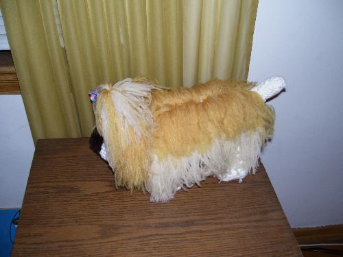 crocheting - This is a crochet dog I make,made with left over yarn and 2 buttens for eyes