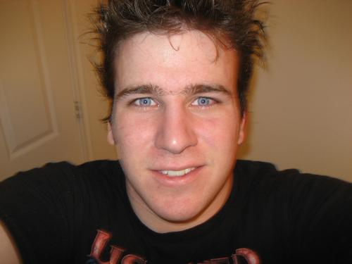 Smile :D - This is me with crazy rocker hair and my kickass Disturbed T-Shirt.  Rock on =]