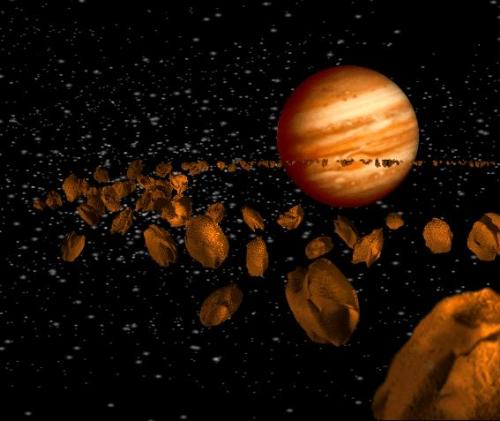 The Asteroid belt - The asteroids are forming a'belt' between Mars and Jupiter and they aree believed to result from the breaking of a planet, called Phaeton, if I remember well. Another theory claims that they never made-up a planet, the material failed to accrete into one.