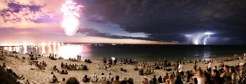 Comets, fireworks and lightning OH MY! -  Explanation: Sometimes the sky itself is the best show in town. On January 26, people from Perth, Australia gathered on a local beach to watch a sky light up with delights near and far. Nearby, fireworks exploded as part of Australia Day celebrations. On the far right, lightning from a thunderstorm flashed in the distance. Near the image center, though, seen through clouds, was the most unusual sight of all: Comet McNaught.  http://antwrp.gsfc.nasa.gov/apod/ap070122.html  The image is actually a three part panorama, digitally processed to reduce the red flare of the fireworks.