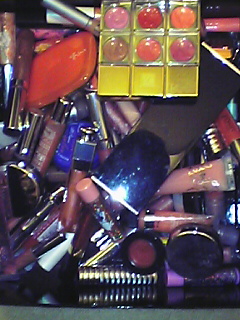 My obsession - This is just some of my lip gloss. More than half of these were bought while I was in Japan. I'm an addict!