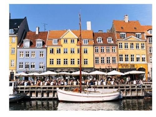 coloured house harbour - It is a photo of coloured house harbour.