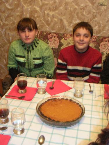 Homemade Pumpkin Pie on the Thanksgiving Table in  - Here is the finished pumpkin pie. ready to serve after a complete turkey dinner, all prepared for friends in eastern Ukraine.  Thanksgiving 2005. Photo (c) Dorine Houston