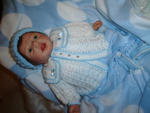 Jody Rae First Reborn Doll (practice) - This is my first attempt at doing a 'reborn' doll. He's not a very pretty little guy, but this was more or less a practice piece. I can see lots of things that should be different, but I'm hoping that with each one, they'll get better.