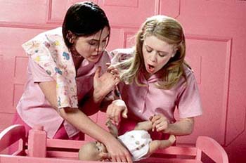 But I'm a Cheerleader - Megan (Lyonne) and Graham (DuVall) trying to put a diaper on a baby doll in But I'm a Cheerleader.