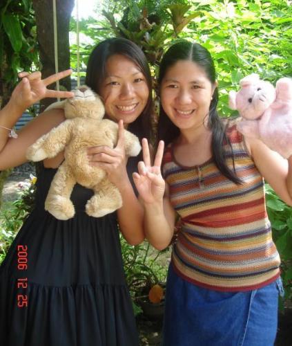 We are cute! - with my older sis playing with puppets