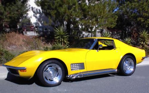 Yellow Stingray Corvette - This is the kind of car that always chased me back to my grandparent's front porch. The only difference is the one in the dream had a white convertible top.