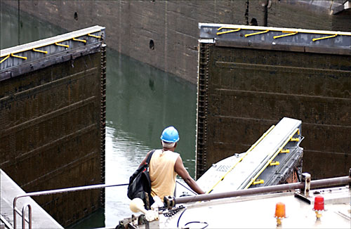 The Panama Canal Locks - View from the side of the canal as one of the sets of locks opens.