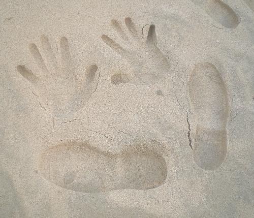 handprints in the sand - This is the handprints i have taken while on a beach holidays in one of the world renowned white sand beach in Philippines.