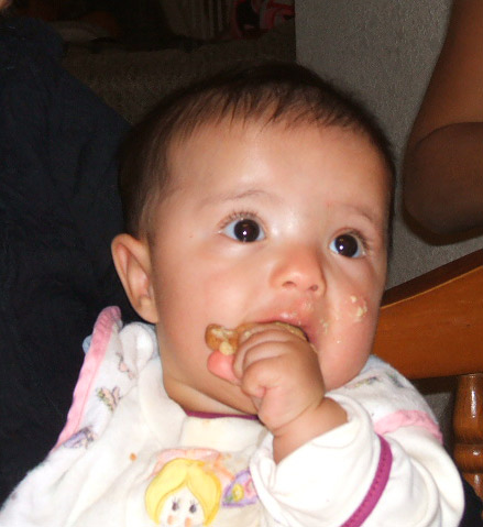 baby eating food - here she is having a snack