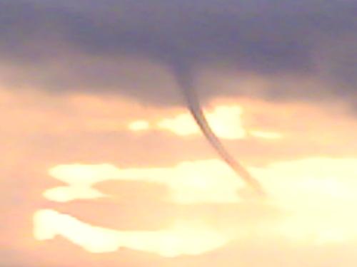 tornado in the making - this was taken atop the condominium on one rainy afternoon by the bay...