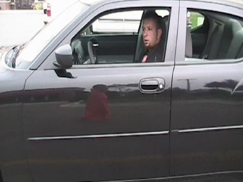 Me in 2006 dodge charger - This a pic of me driving my buddys 06 charger!