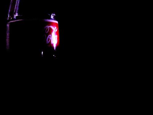 Empty Bottle of Coke - This photo was taked under low light without a flash. I then enhanced the image by increading the contrast and the sharpness. 