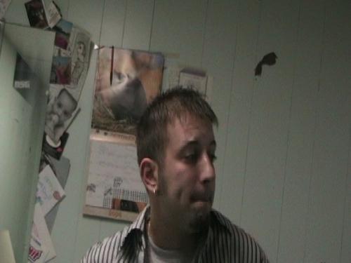 ME! - Picture of me sitting on the bed downstairs. Poor quality, sorry.
