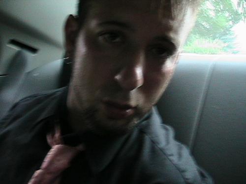 Me! - Picture of me in the back of my buddys 06 charger. How do I look?