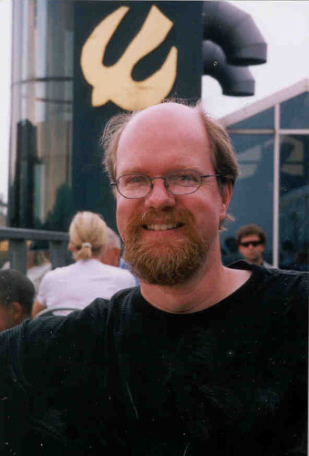 Me - Photo of me, taken last time I was in Copenhagen visiting relatives. No, those are not moose antlers I'm wearing; it's part of the building behind me.