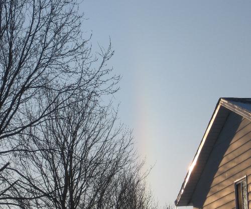 Winter Rainbow - A picture of a rainbow in the middle of winter on a very cold, blustery day.
