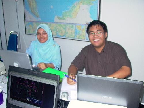 Me and my colleague - This photo taken by my company's chairman. He really like photography so much. Every site visit, he will surely bring along his camera.