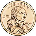 Sacagawea One Dollar Coin - The Golden Dollar's obverse, or heads, has Sacagawea portrayed in three-quarter profile. In a departure from numismatic tradition, she looks straight at the holder. On her back, Sacagawea carries Jean Baptiste, her infant son. Six months pregnant when she joined the Lewis and Clark expedition, Sacagawea gave birth to Jean Baptiste early in the journey.