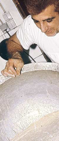 A man cooking halva - Halva a sweet they use eat the more arabic and east Mediterranean coutries