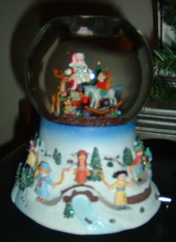 Christmas snow globe - This is my christmas holiday snow globe. It is part of the partylite collection.