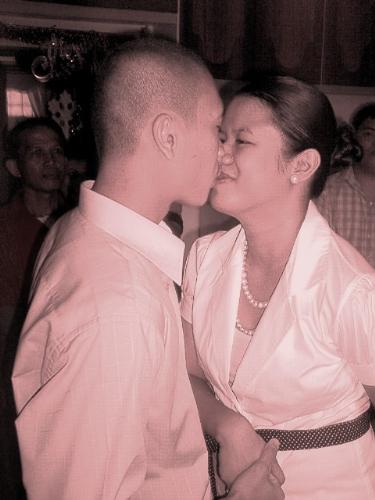 a kiss - taken during our civil wedding 12/30/06