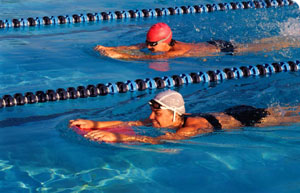 Swimming - Two women swimming in the swimming pool
