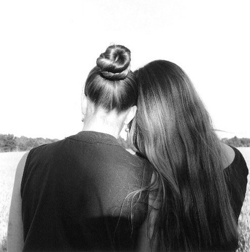 Sisters - Sisters on a Sunday afternoon, in May, sharing each other's thoughts.
