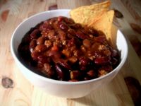Chili - a bowl of chili con carn with a tortilla chip garnish.