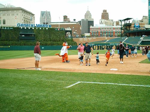 Kids running the bases on Tiger Stadium :) - It was run the bases day for the kids at the game we went to.