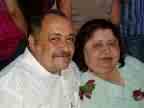 lin and eddie - Mfriend and her husband at a party sitting down