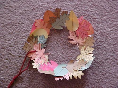 Fall Wreath of Leaves - I made this with a paper/plastic plate, leftover construstion paper and leftover string.